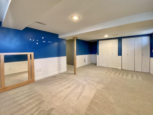 basement with carpet flooring