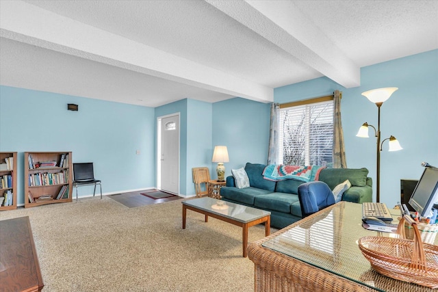 living room featuring beamed ceiling, carpet flooring, and a textured ceiling