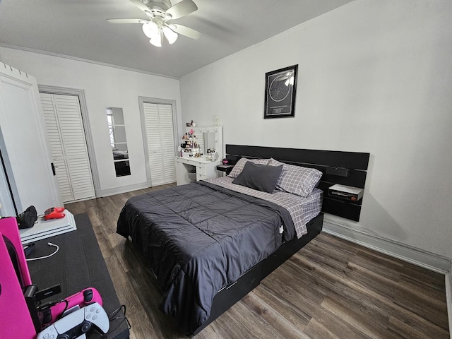 bedroom featuring a ceiling fan, baseboards, and wood finished floors