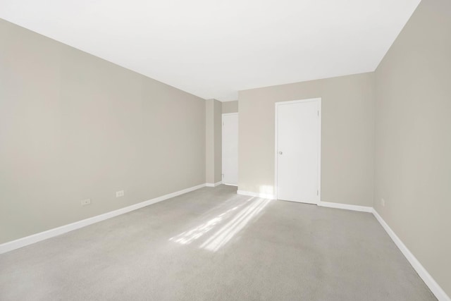 unfurnished room with carpet floors