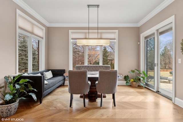 6 Ivy Ln, Oak Brook, IL 60523 - dining space featuring ornamental molding and a healthy amount of sunlight
