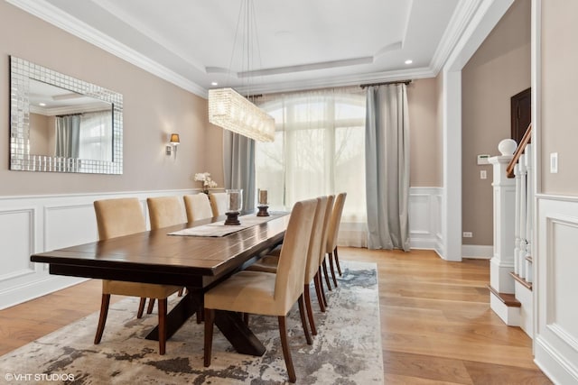 6 Ivy Ln, Oak Brook, IL 60523 - dining area with crown molding, plenty of natural light, a decorative wall, and a tray ceiling