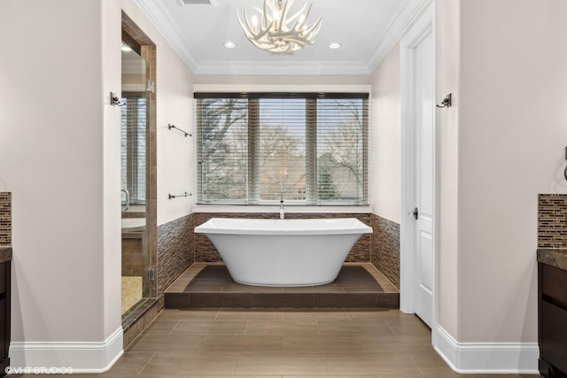 6 Ivy Ln, Oak Brook, IL 60523 - full bath with a stall shower, an inviting chandelier, ornamental molding, and vanity