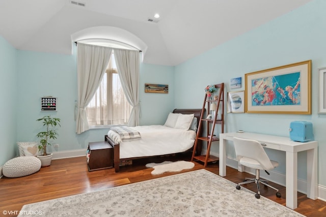 6 Ivy Ln, Oak Brook, IL 60523 - bedroom featuring visible vents, baseboards, lofted ceiling, and wood finished floors
