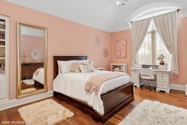 6 Ivy Ln, Oak Brook, IL 60523 - bedroom with visible vents, wood finished floors, and vaulted ceiling