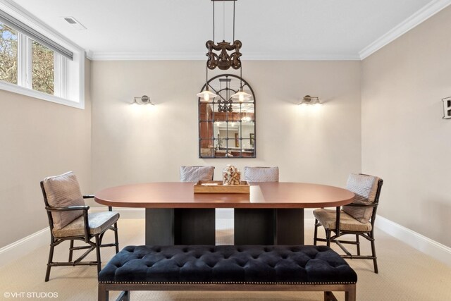6 Ivy Ln, Oak Brook, IL 60523 - dining space featuring baseboards, light colored carpet, and ornamental molding