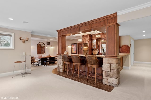 6 Ivy Ln, Oak Brook, IL 60523 - bar featuring crown molding, baseboards, light colored carpet, and bar