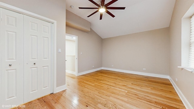 unfurnished room featuring vaulted ceiling, ceiling fan, and hardwood / wood-style floors