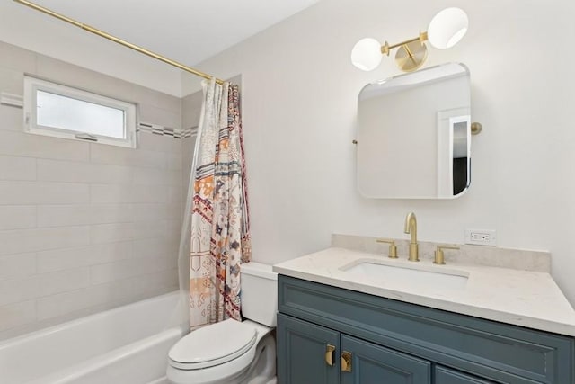 full bathroom with vanity, toilet, and shower / bath combo