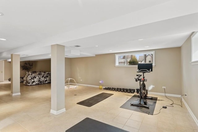 workout room with light tile patterned flooring