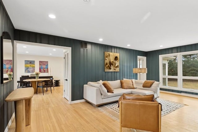 living room with light hardwood / wood-style flooring