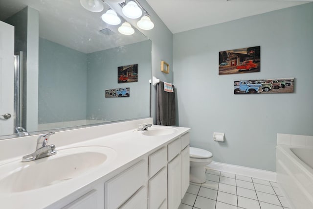 bathroom featuring tile patterned floors, toilet, vanity, and a bath