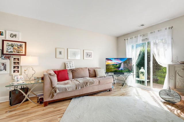 living room featuring light wood-type flooring