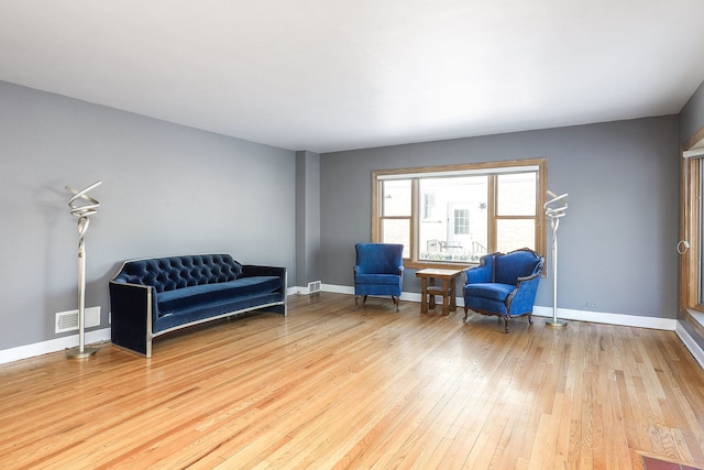 sitting room with light wood-type flooring