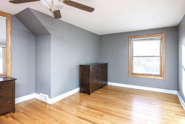 unfurnished bedroom featuring ceiling fan and light wood-type flooring