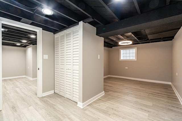 basement with light wood-type flooring