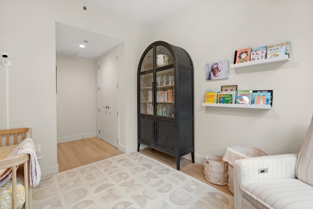 living area with wood-type flooring