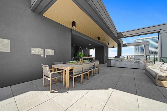 view of patio / terrace featuring an outdoor kitchen and area for grilling