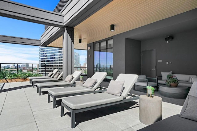 view of patio with a balcony