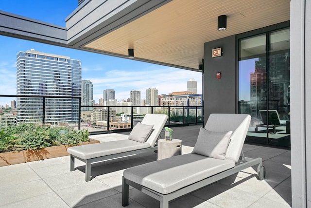 view of patio with a balcony