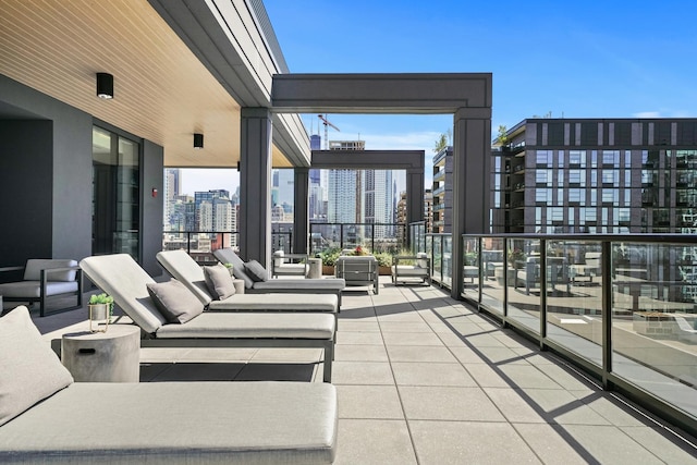 view of patio / terrace featuring a balcony