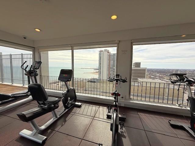 exercise area with recessed lighting and a healthy amount of sunlight