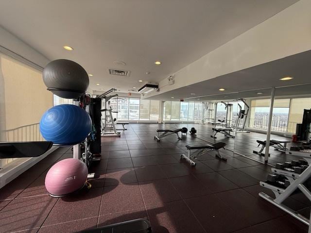 workout area with recessed lighting and visible vents