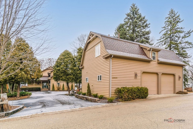 view of home's exterior with a garage