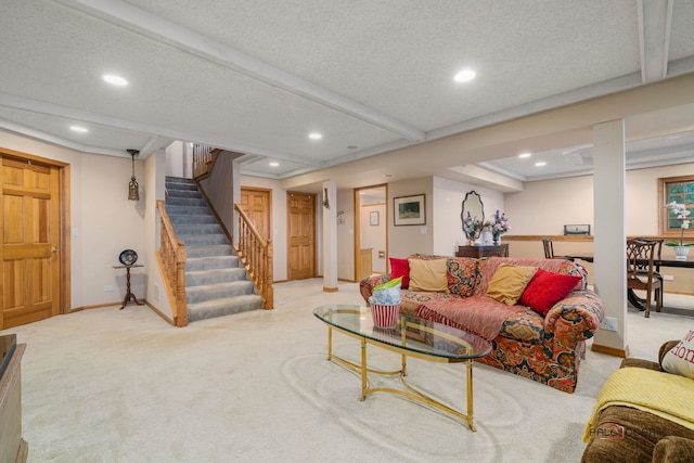 carpeted living room with a textured ceiling