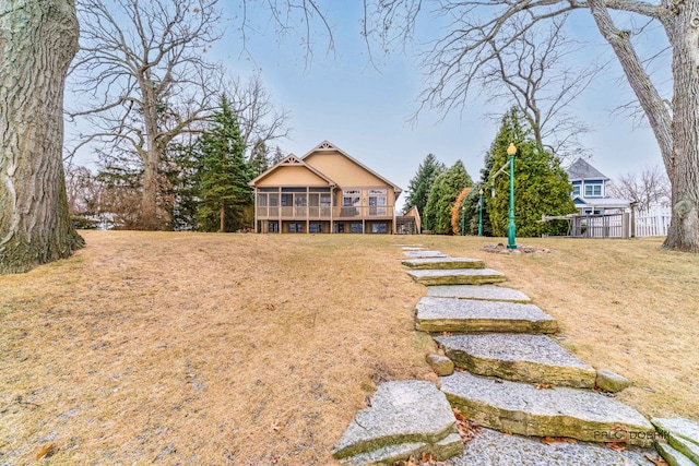 view of yard with a sunroom