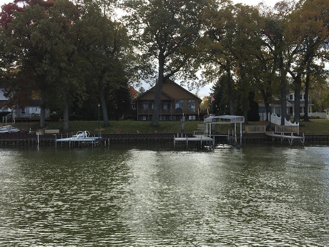 water view featuring a dock