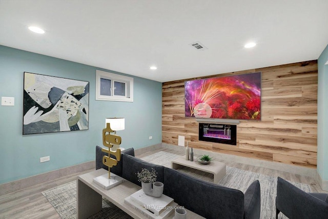 interior space featuring wooden walls and wood-type flooring