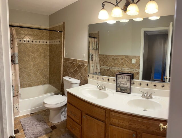 full bathroom featuring tile walls, vanity, shower / bath combo, and toilet