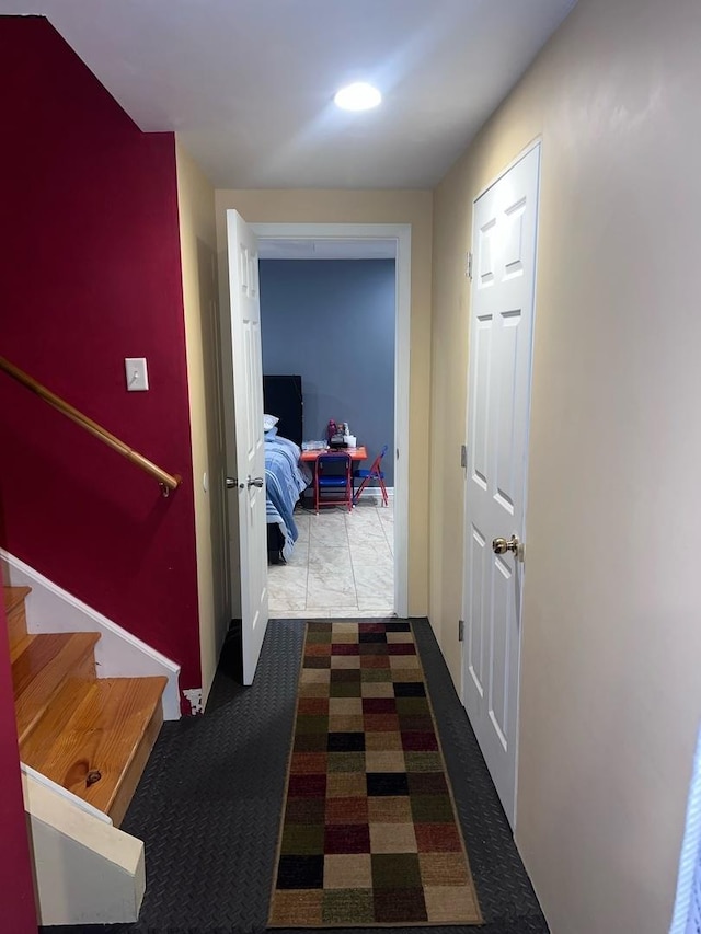 hallway with carpet flooring