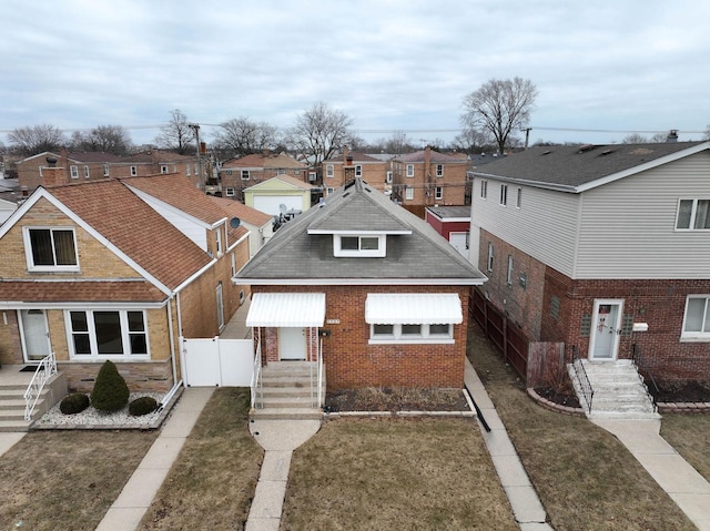 view of front facade with a front yard