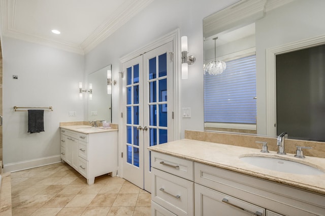 bathroom featuring ornamental molding, vanity, tile patterned floors, and french doors