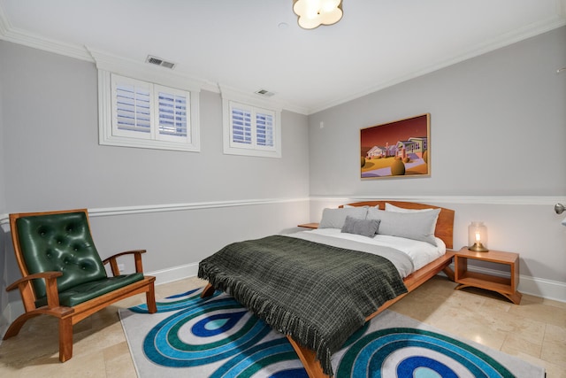 bedroom with crown molding