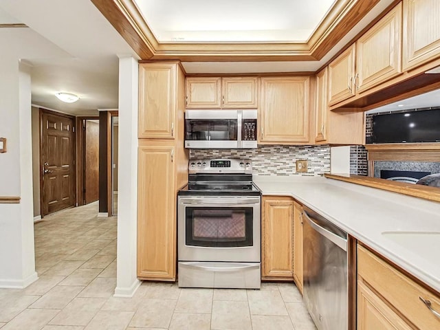 kitchen featuring stainless steel appliances, light tile patterned floors, backsplash, and light brown cabinetry