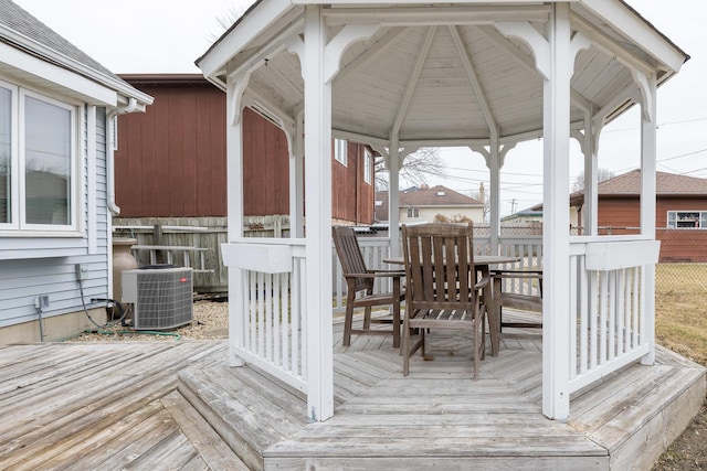 wooden deck featuring a gazebo and central AC