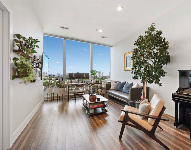 living room with dark hardwood / wood-style flooring