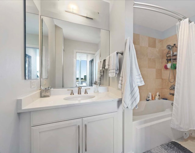 bathroom featuring shower / bath combination with curtain and vanity