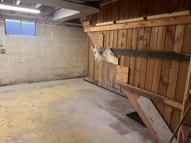 hallway with concrete floors