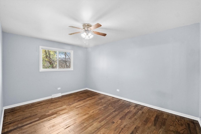 unfurnished room with hardwood / wood-style floors and ceiling fan