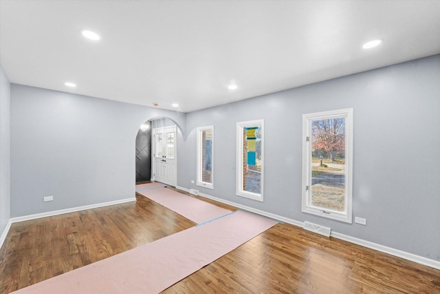 interior space with hardwood / wood-style floors