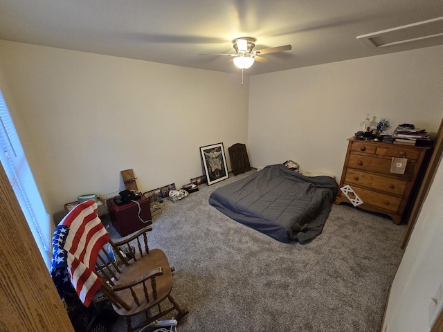 bedroom with ceiling fan and carpet