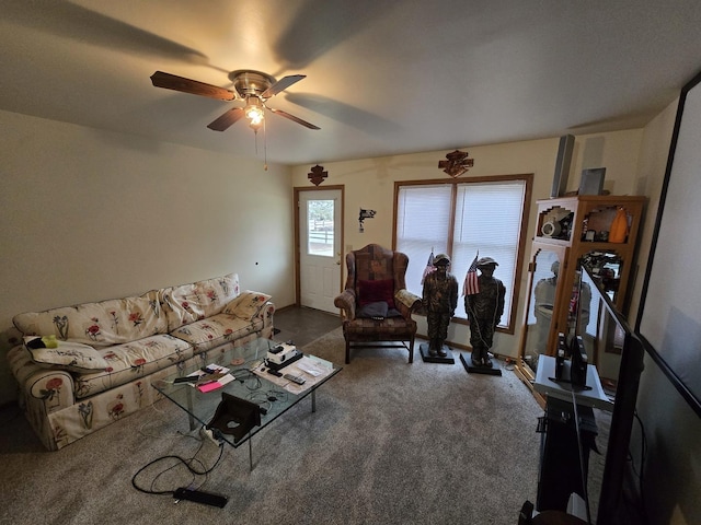 living room with carpet flooring and ceiling fan