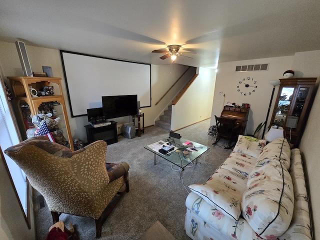 carpeted living room featuring ceiling fan