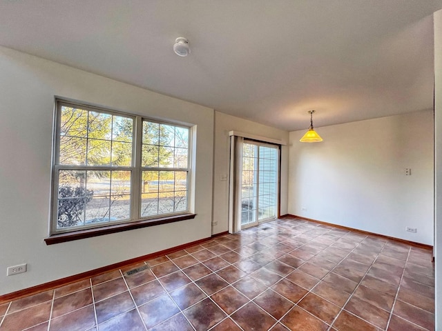 view of tiled spare room