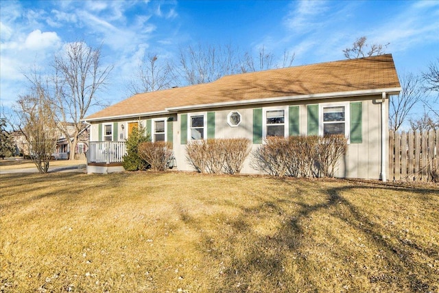 single story home with a front yard