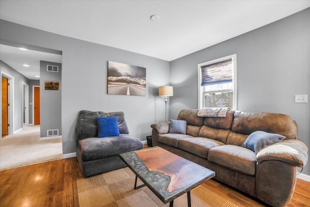 living room with hardwood / wood-style flooring